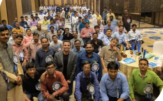 Badged group of people clicked for photograph